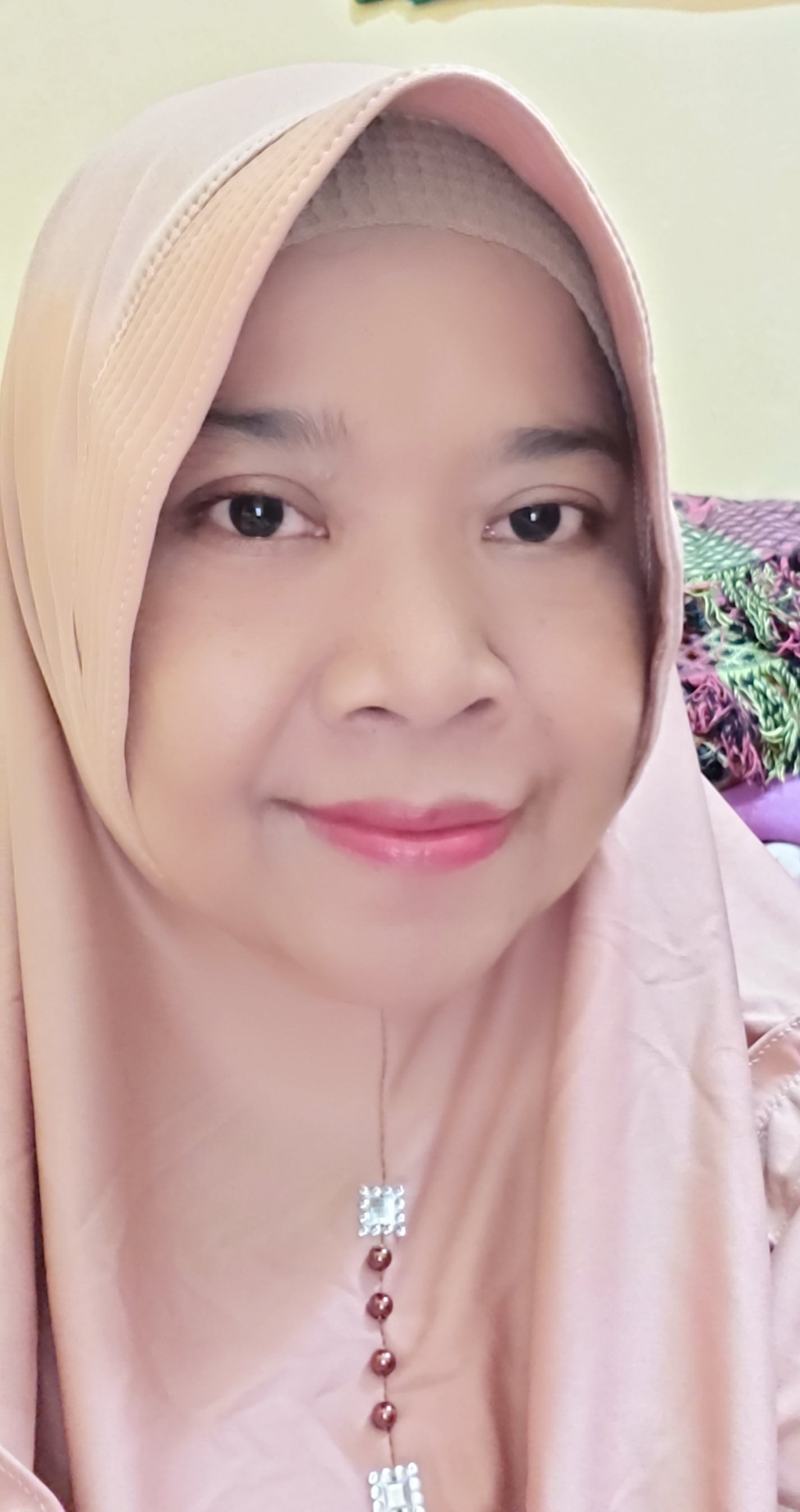 Ratna Komara, SP, M.Si
